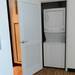 A stackable washer and dryer are ticked away in a closet at Landmark. Melanie Maxwell I AnnArbor.com